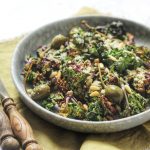 Crunchy Kale Salad with pine nuts and caper berries