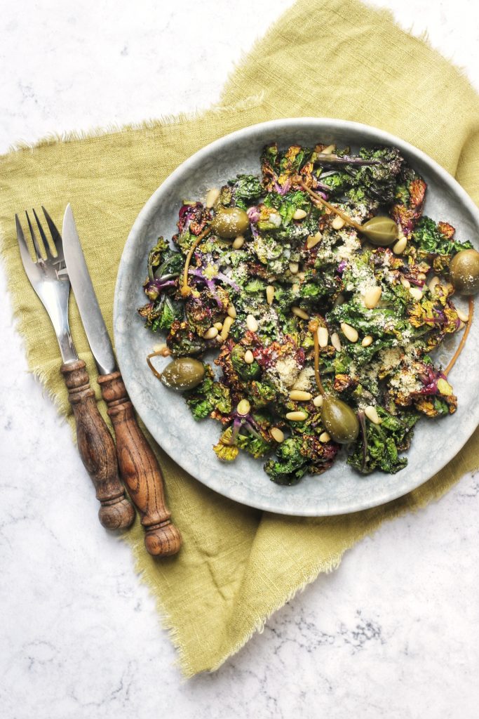 Crunchy Kale Salad with pine nuts and caper berries