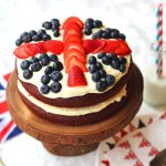 Celebrate in Great British style with this Red Velvet Layer Cake covered in Cream Cheese Frosting and Fresh Berries