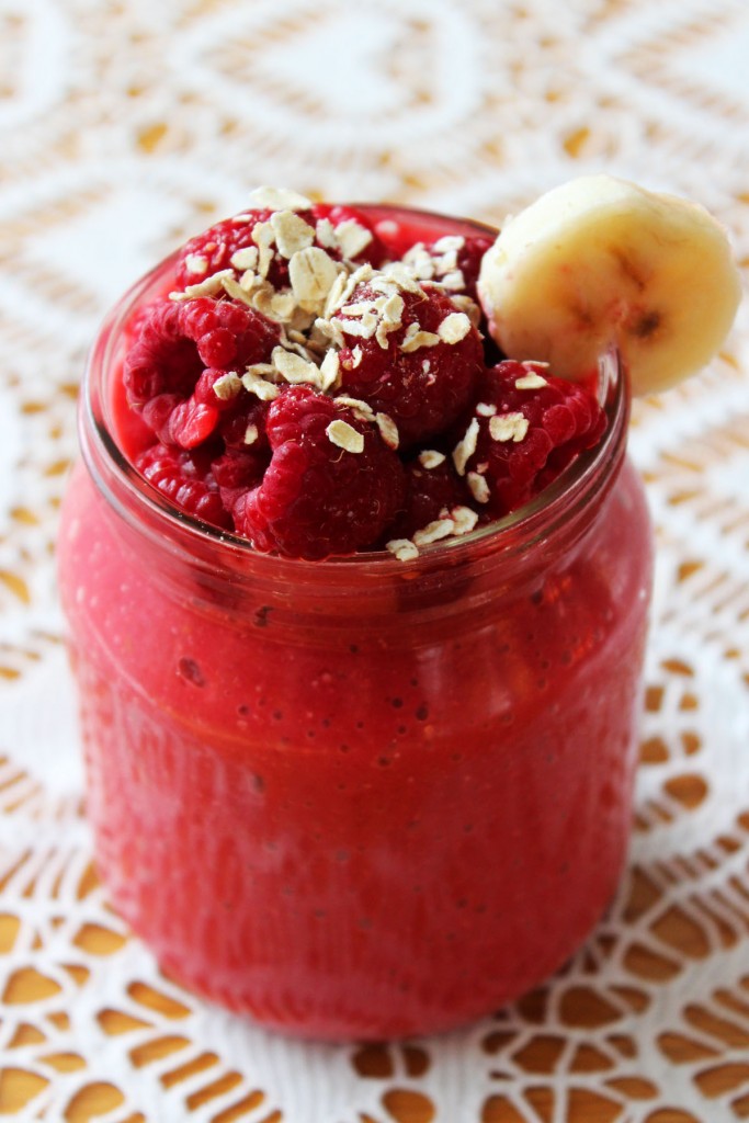 Raspberries bananas rolled oats and orange make this Breakfast Smoothie a meal in a glass