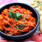 This Slow Cooker Butternut Squash and Coconut Curry cooks low and slow so it's ready in time for dinner! Serve with naan bread for an easy mid-week meal! Get the recipe at Supper in the Suburbs!