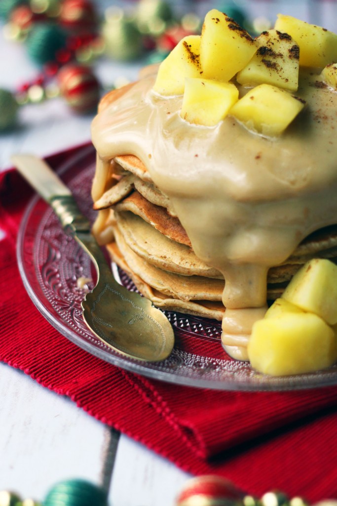 These cinnamon pancakes are dripping with caramel sauce and topped with stewed apples