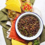 Slow Cooked Black Beans the perfect filling for crispy corn tacos