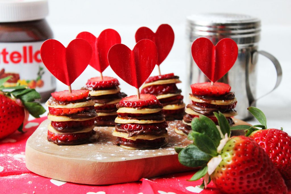 These Mini Nutella and Strawberry Pancake Stacks are perfect for pancake day, valentines day, a birthday treat or, just because! Get the recipe at Supper in the Suburbs