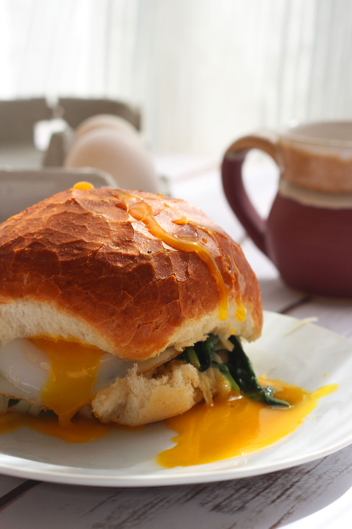 Duck egg sandwich with gruyere and spinach