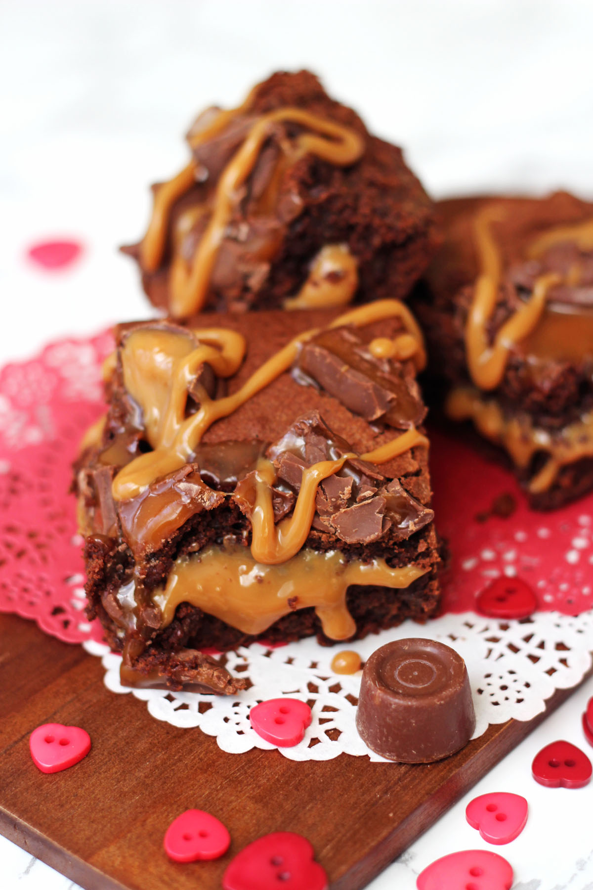 These Rolo Stuffed Brownies are oozing sweet caramel in between dark fudgy brownie find the recipe here