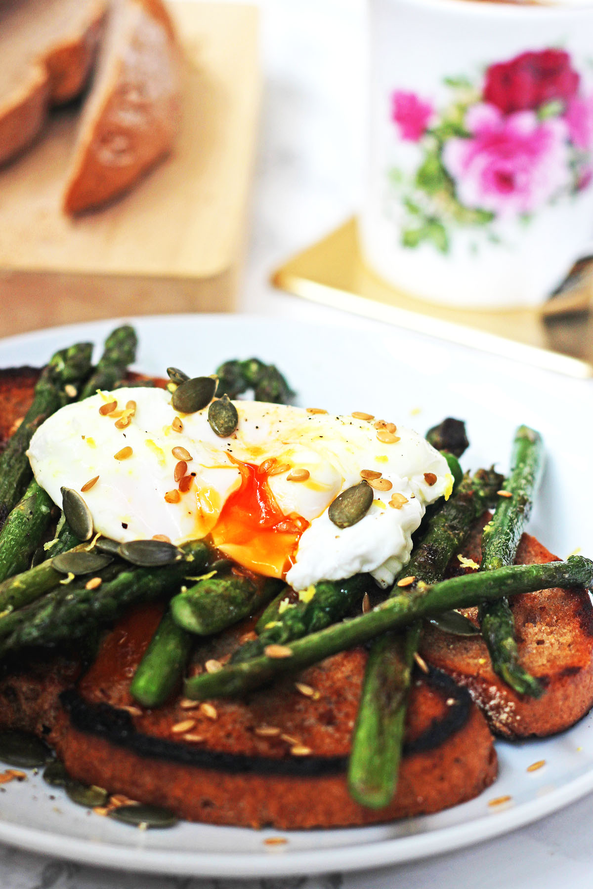 Brighten up breakfast with griddled asparagus and poached egg on toast golden linseed and pumpkin seeds