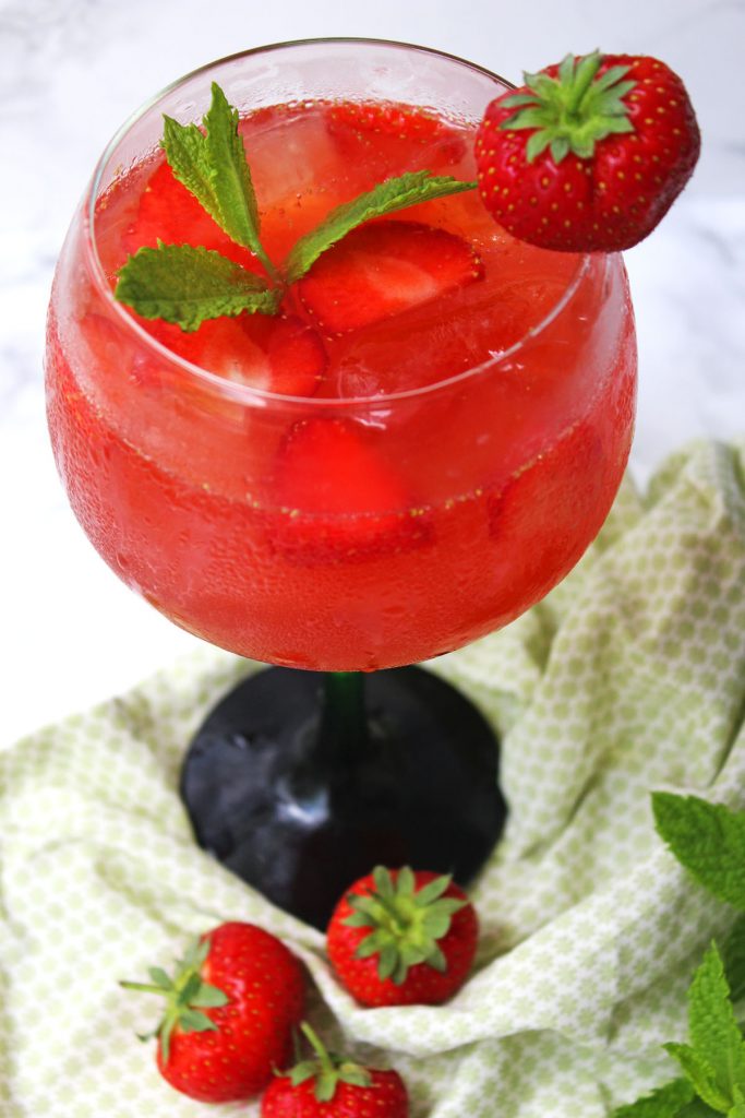 This Strawberry and Gin Smash is the perfect summer cocktail, ideal for slowly sipping in front of the Tennis when Wimbledon kicks off later this week! Get the recipe at Supper in the Suburbs!