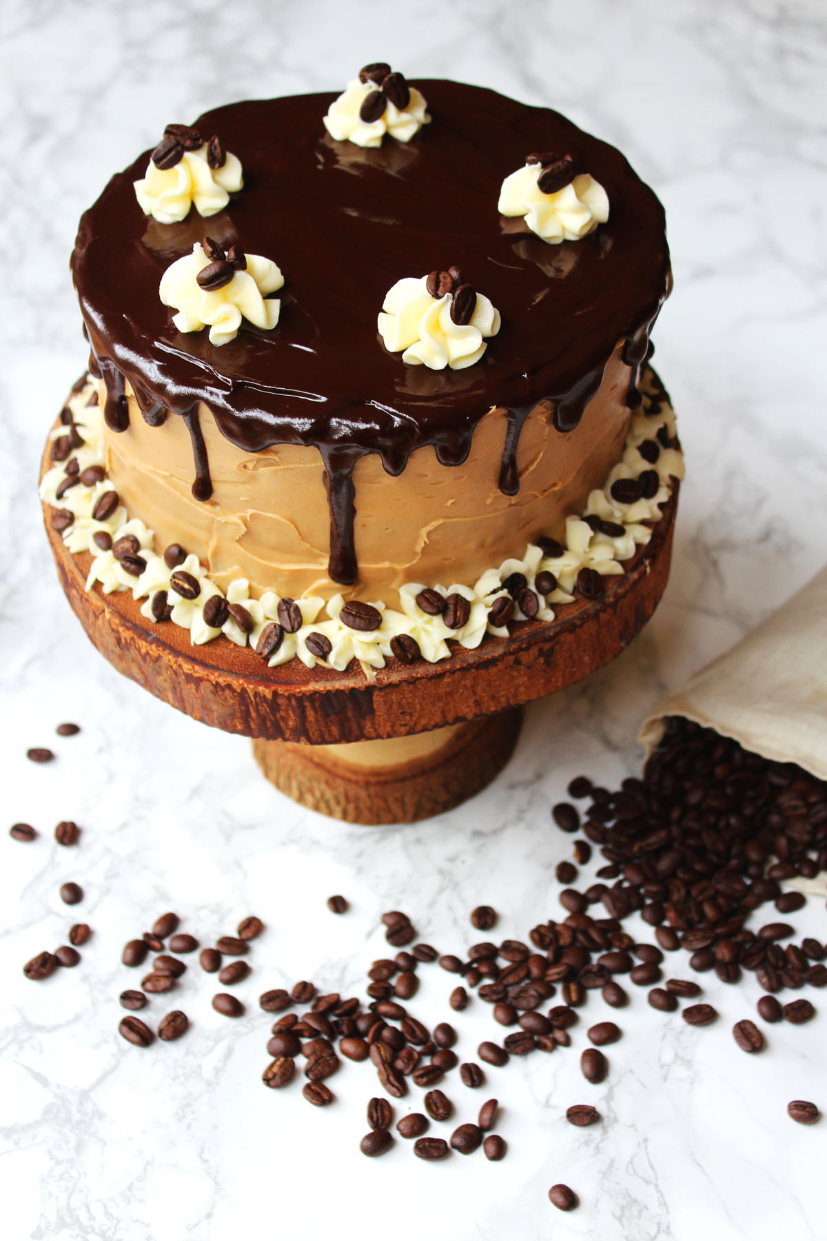 This stunning Mocha Cake is perfect for any celebration whether its a birthday, anniversary, or just to say thank you. Get the recipe for this stunning cake at Supper in the Suburbs