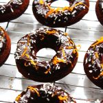 Baked Chocolate Orange and Coconut Doughnuts make a tasty afternoon snack, decadent breakfast or chocolatey treat just because. Get the recipe at Supper in the Suburbs
