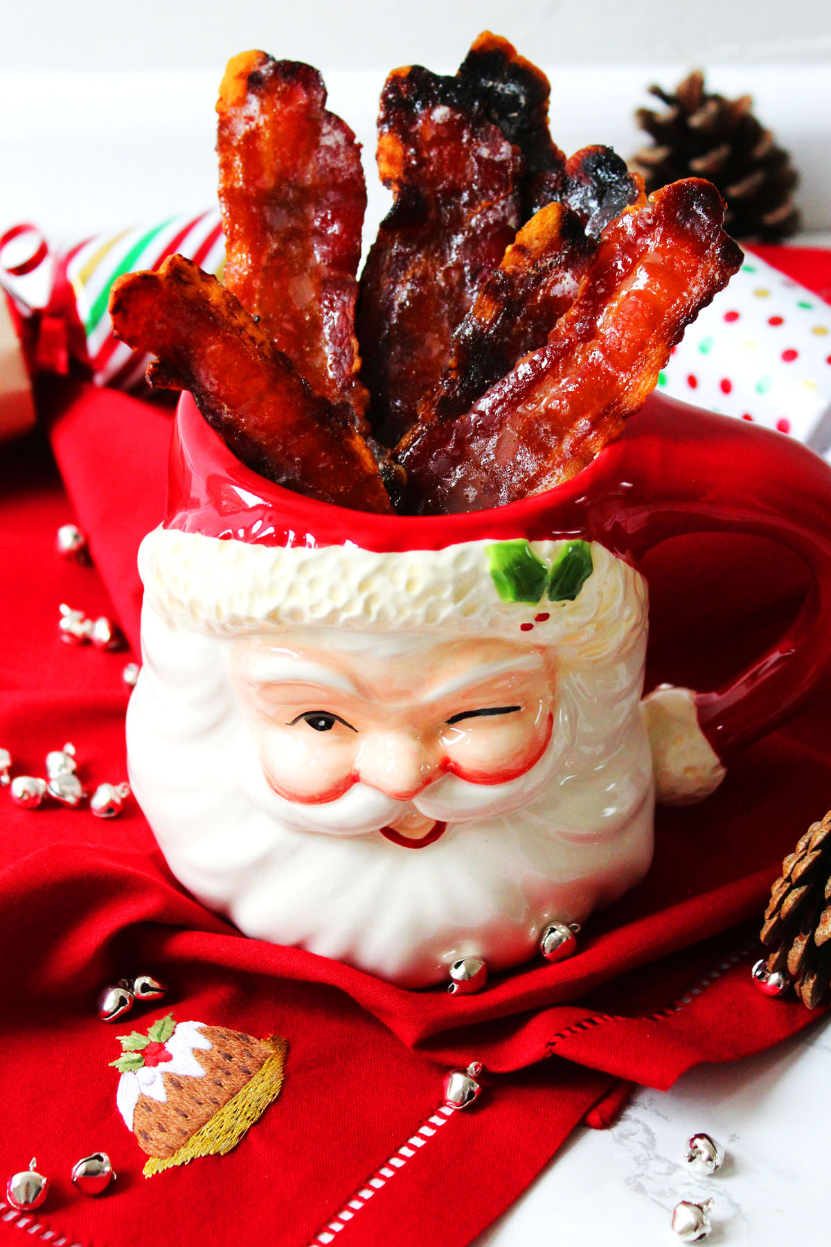 Cinnamon Candied Bacon is the perfect festive appetizer. Serve with cocktails and other canapes at your Christmas party. Get the recipe at Supper in the Suburbs!