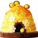 This playful children's bee hive celebration cake is perfect for birthdays and christenings. Get the recipe at Supper in the Suburbs!