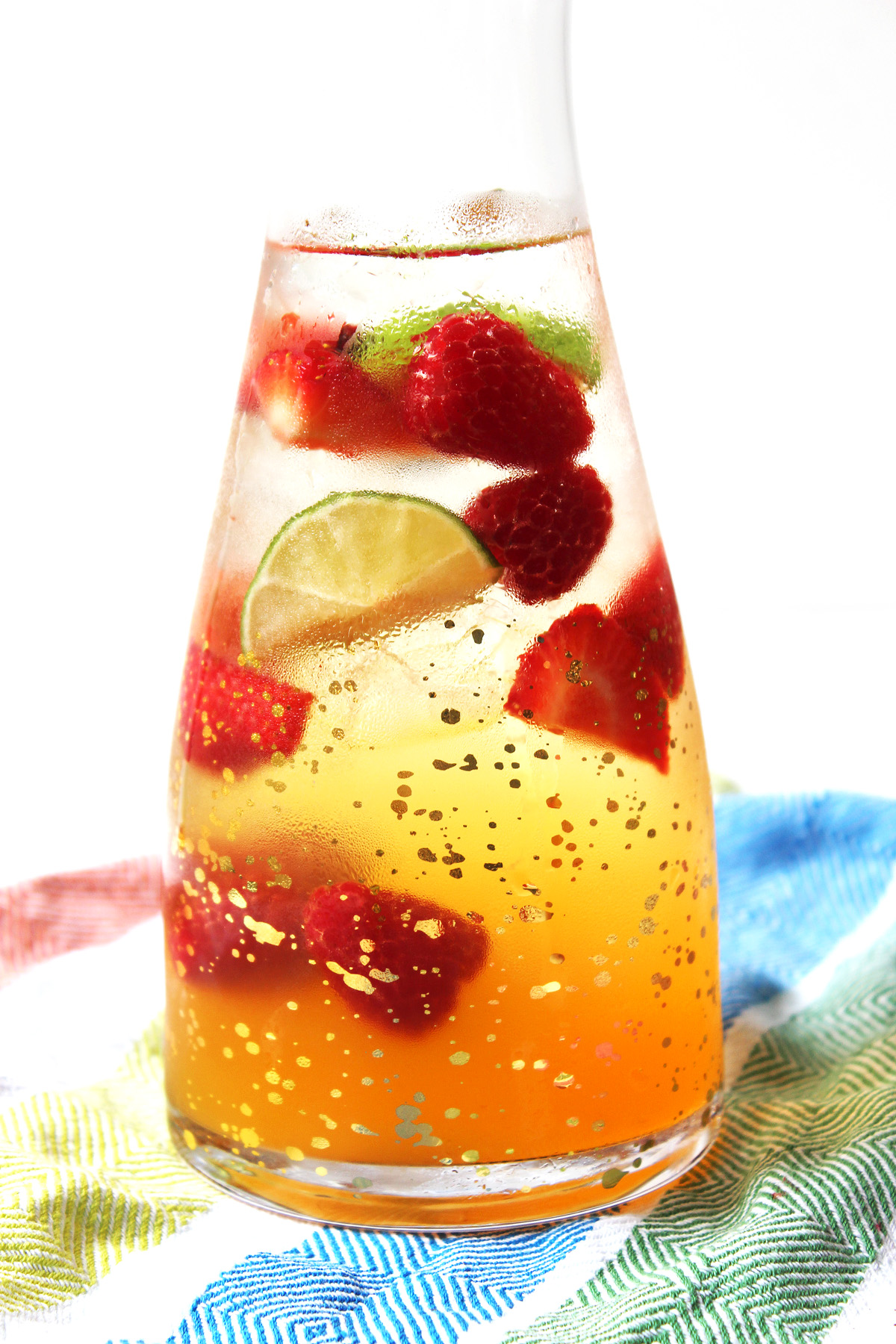 White Wine Sangria is a lighter twist on a Spanish classic. Find out how to make this summer cocktail on Supper in the Suburbs