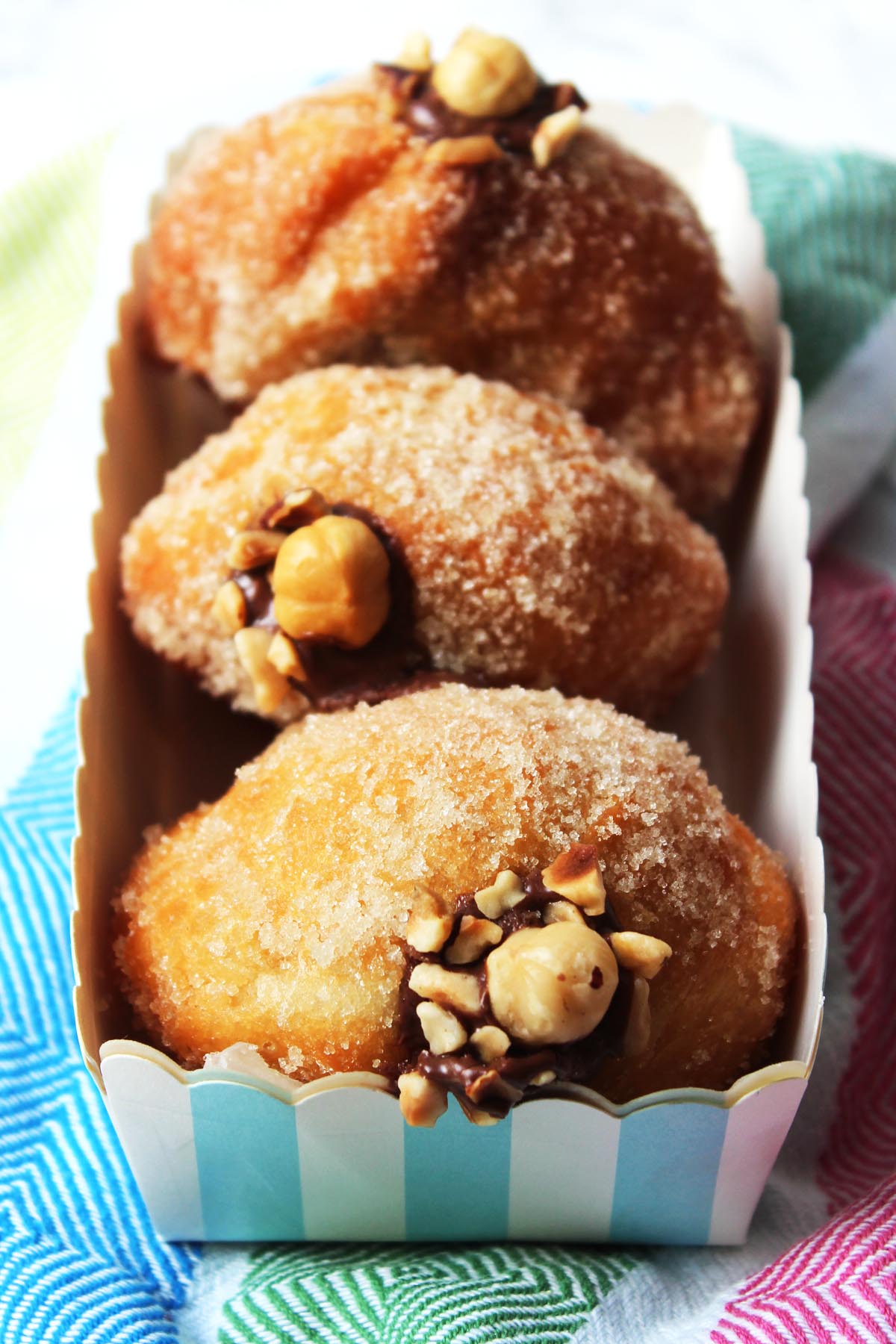 Everybody will love these Nutella Doughnuts. Stuffed which your favourite chocolate and hazelnut spread these deep fried doughnuts are a real treat! Get the recipe at Supper in the Suburbs!