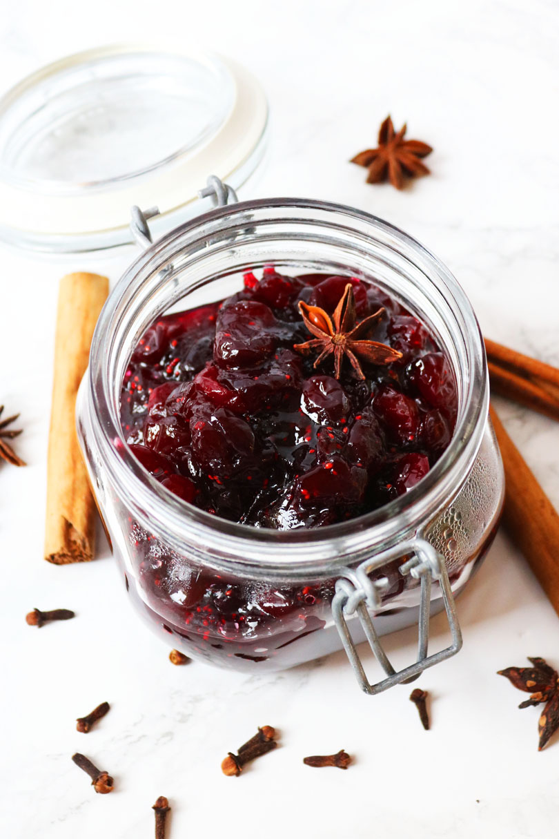This Boozy Bourbon Cranberry Sauce can be made ahead - serve alongside your turkey at Christmas or Thanksgiving