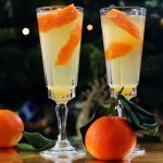 Celebrate the New Year with this delicious Clementine Mimosa, made with fresh clementine juice and prosecco. Get this festive brunch cocktail recipe at Supper in the Suburbs!