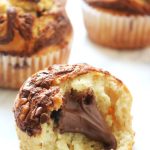 These Nutella Stuffed Muffins are the perfect way to celebrate Wolrd Nutella Day. Get the recipe at Supper in the Suburbs!