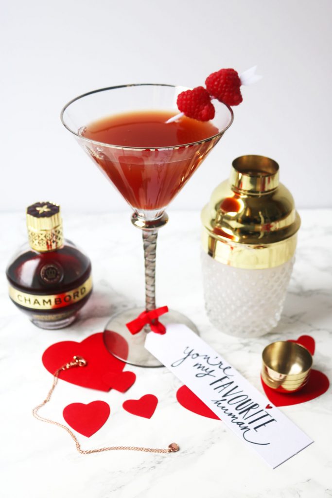 This twist on a French Martini swaps vodka for gin and vermouth. Garnished with fresh raspberries this Chambord cocktail is perfect for Valentines Day!