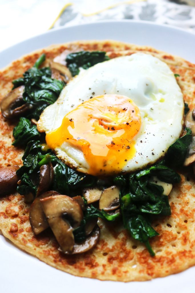 Thin crepes topped with spinach and mushroom, crumbled stilton and a gooey fried egg! The perfect breakfast, brunch or dinner!