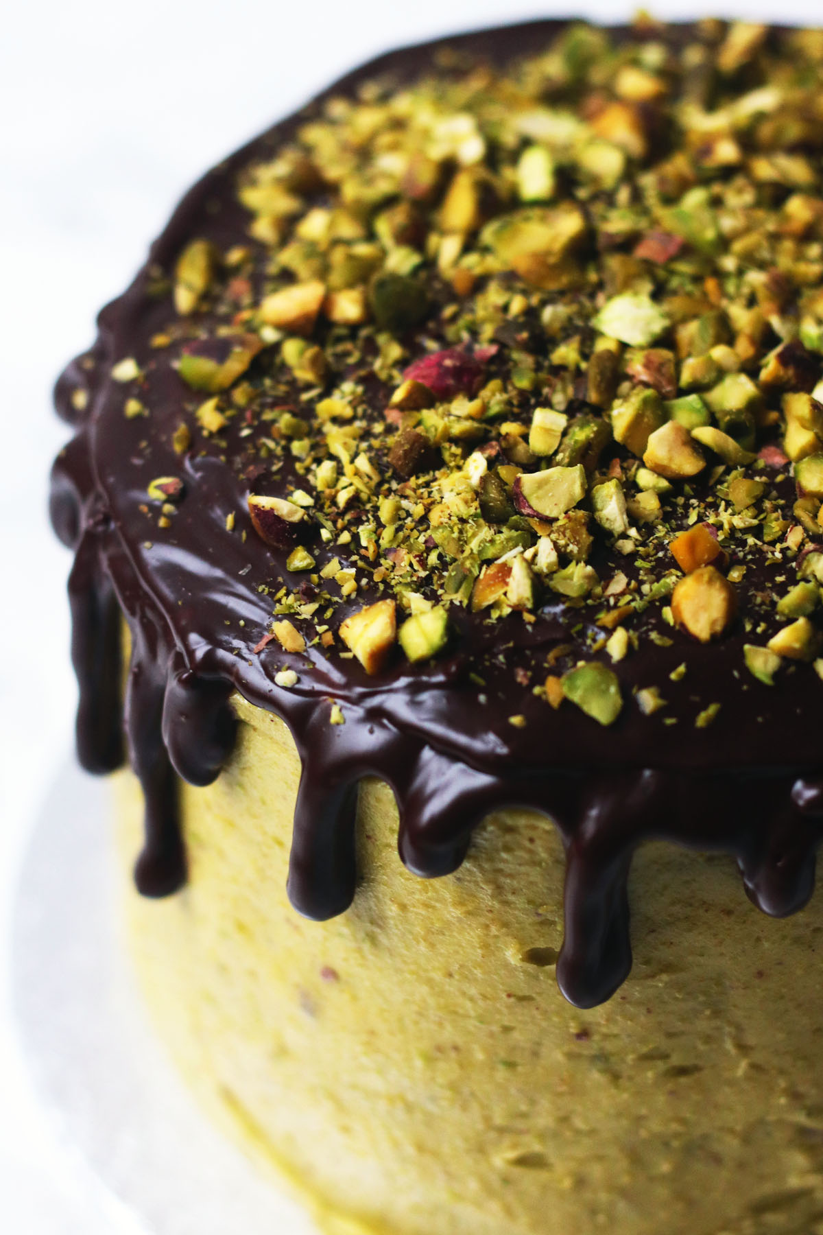 Chocolate and Pistachio Cake on a gold cake stand 3