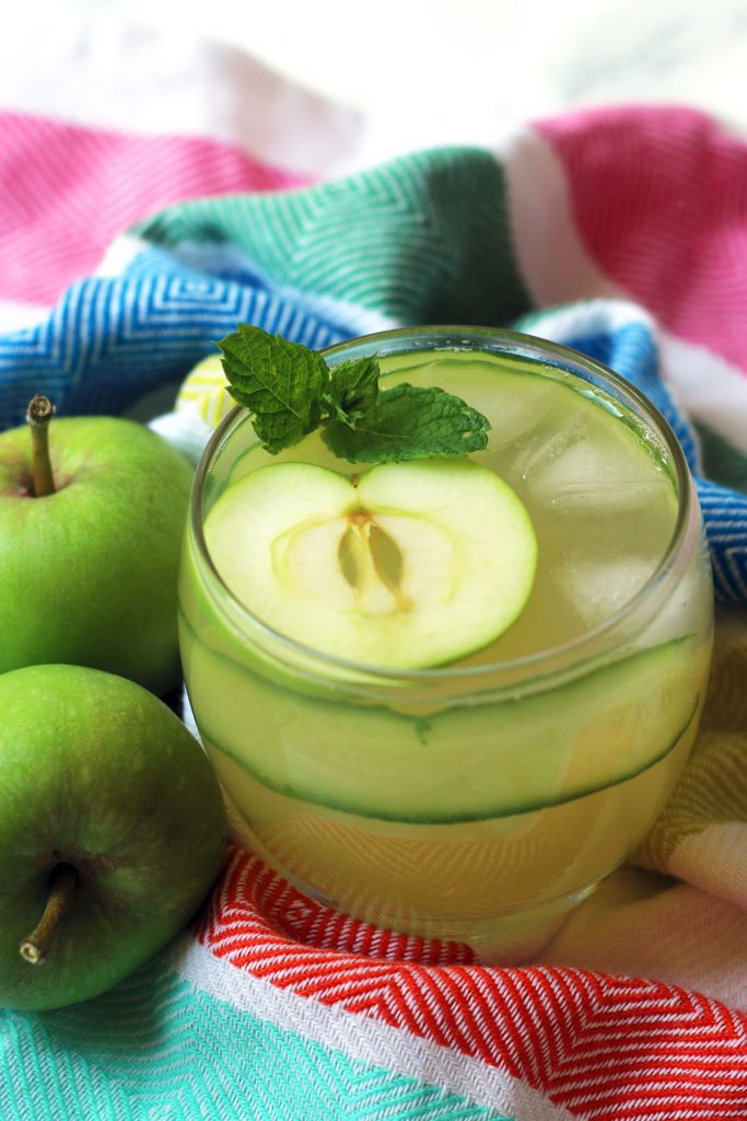 Apple Gimlet with cucumber and mint garnish