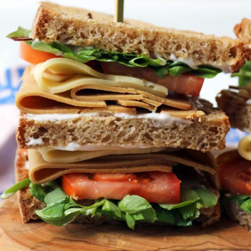 Close up of half a vegan club sandwich