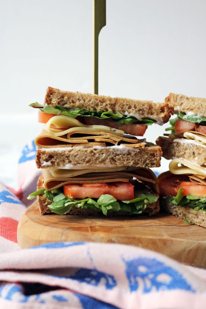 Close up of half a vegan club sandwich