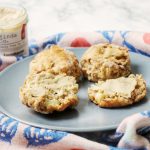 Apple and sourdough scones spread with vegan cheese