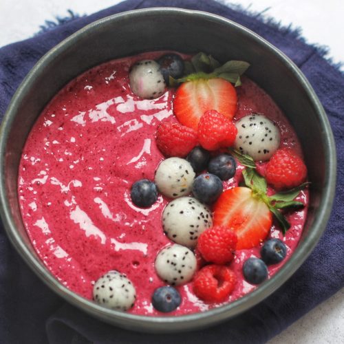 Dragon Fruit and Raspberry Smoothie Bowl with banana and oats