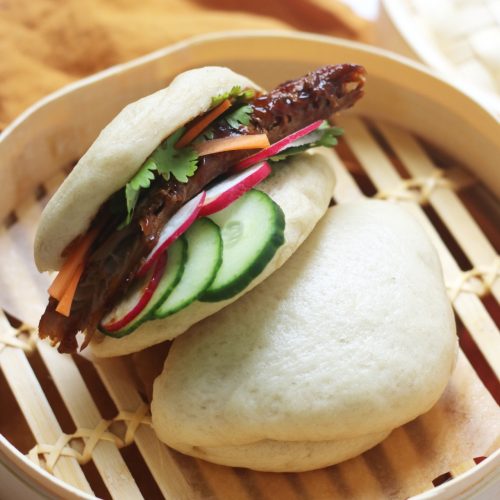 Vegan Steamed Bao Buns stuffed with plant based pork ribs