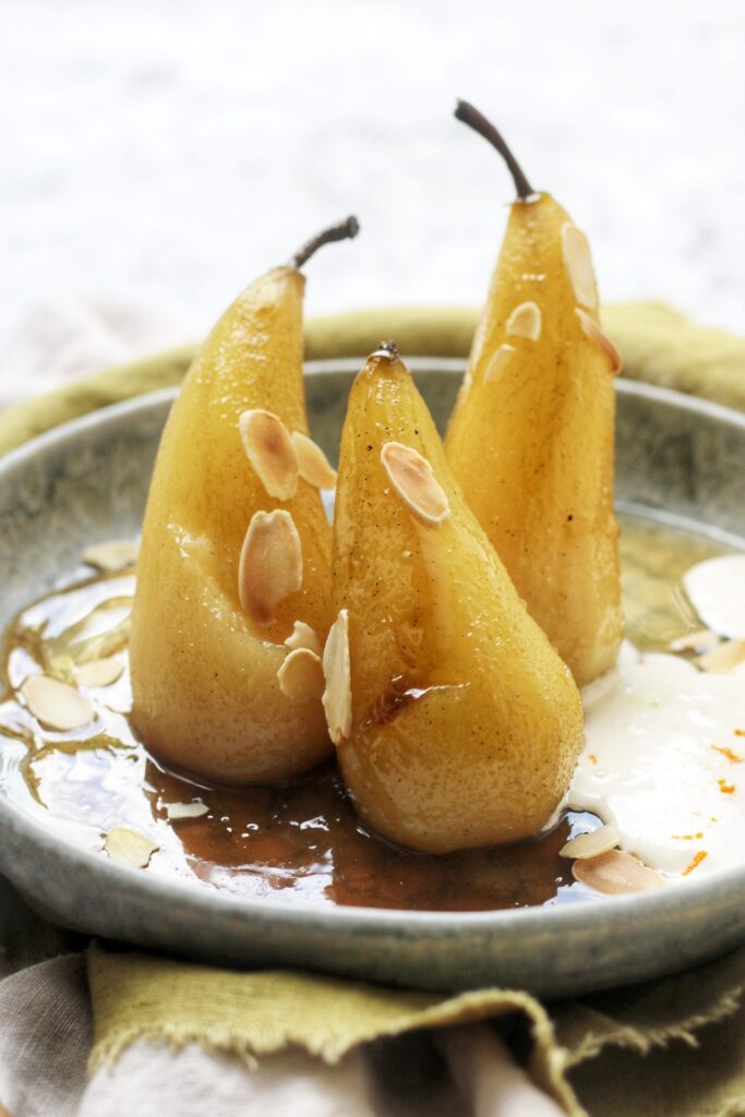 Sweet and Spicy Poached Pears with Flaked Almonds