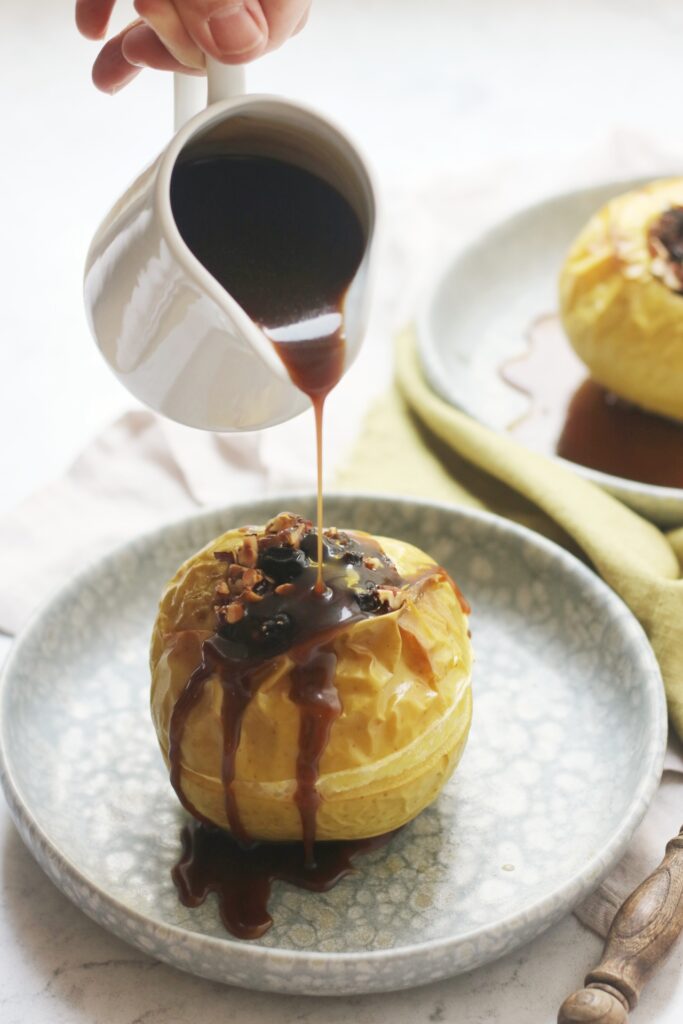 Fruit and Nut Stuffed Baked Apples served with Caramel Sauce