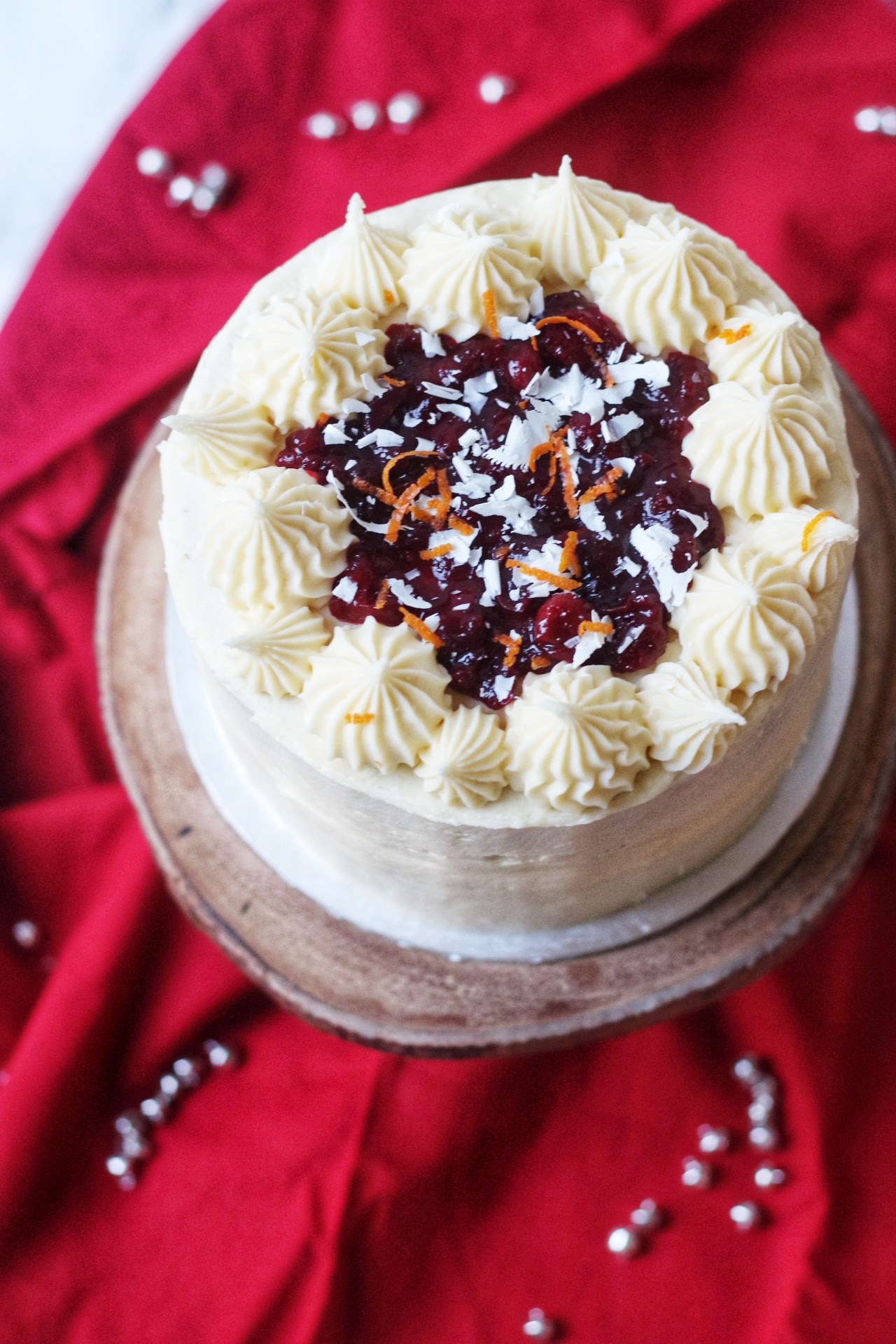 https://supperinthesuburbs.com/wp-content/uploads/2021/12/Vegan-White-Chocolate-and-Cranberry-Cake-01.jpeg