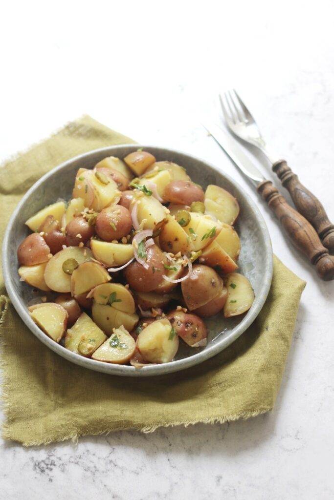 Vegan Potato Salad with cornichons and chopped hazelnuts