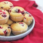 A plate of vegan cranberry muffins