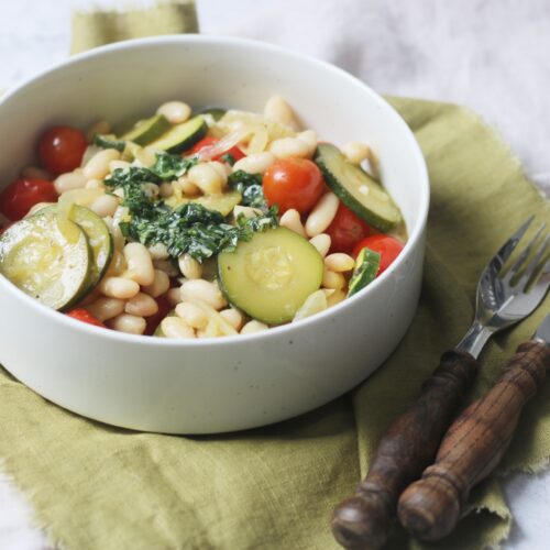 Braised Courgette and Tomato Cannelini beans with pistou