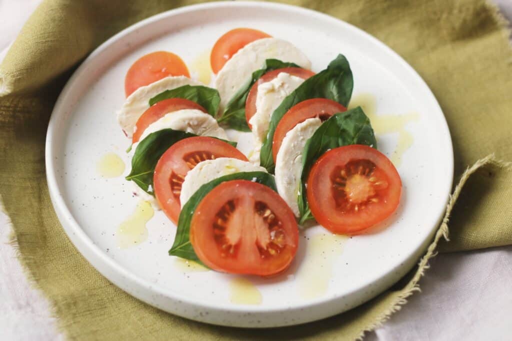 Caprese Salad made with Homemade Vegan Mozzarella Cheese Balls