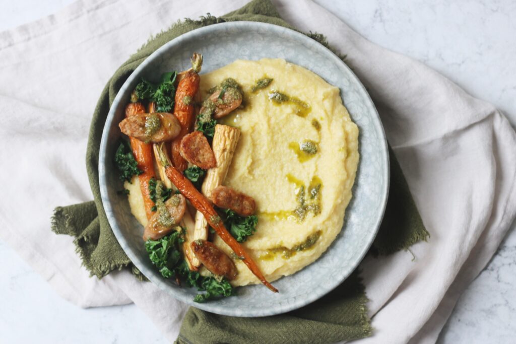 Vegan Sausage and Roasted Vegetables with Creamy Polenta