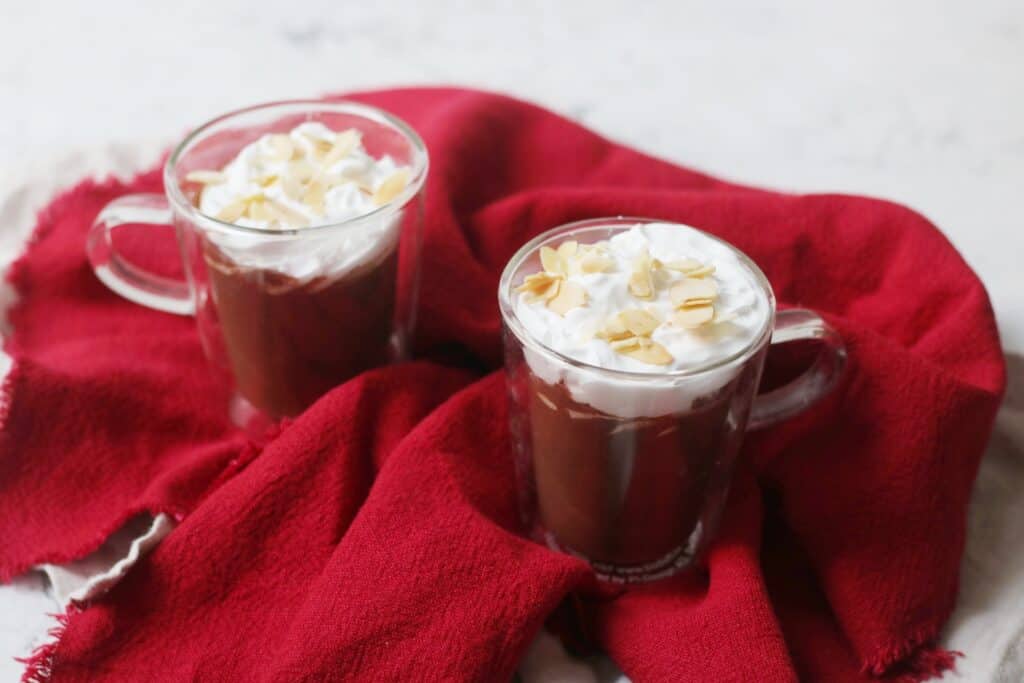 Two mugs of Vegan Amaretto Hot Chocolate