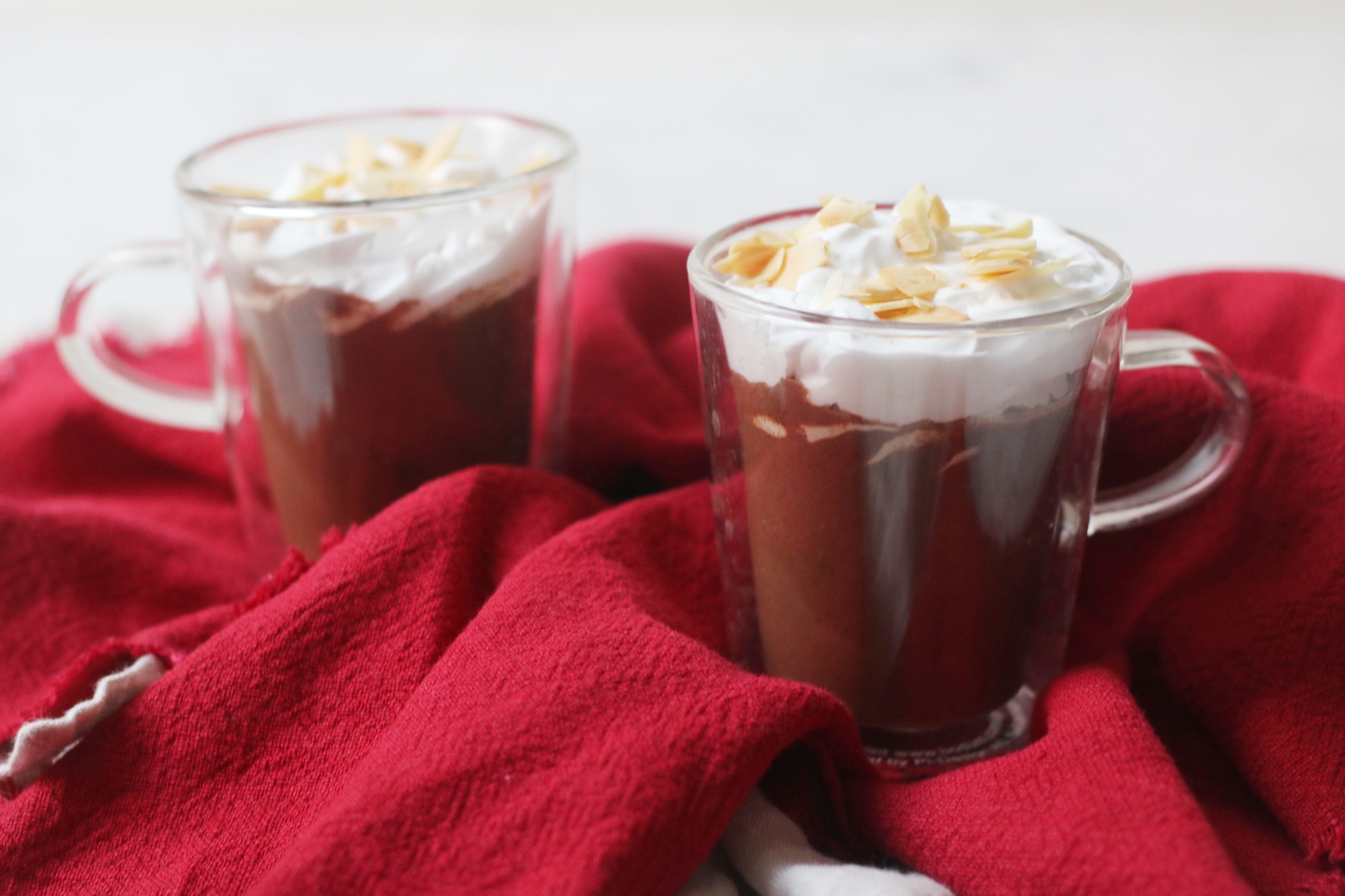 Two mugs of Vegan Amaretto Hot Chocolate