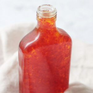 A small bottle of sweet chilli sauce