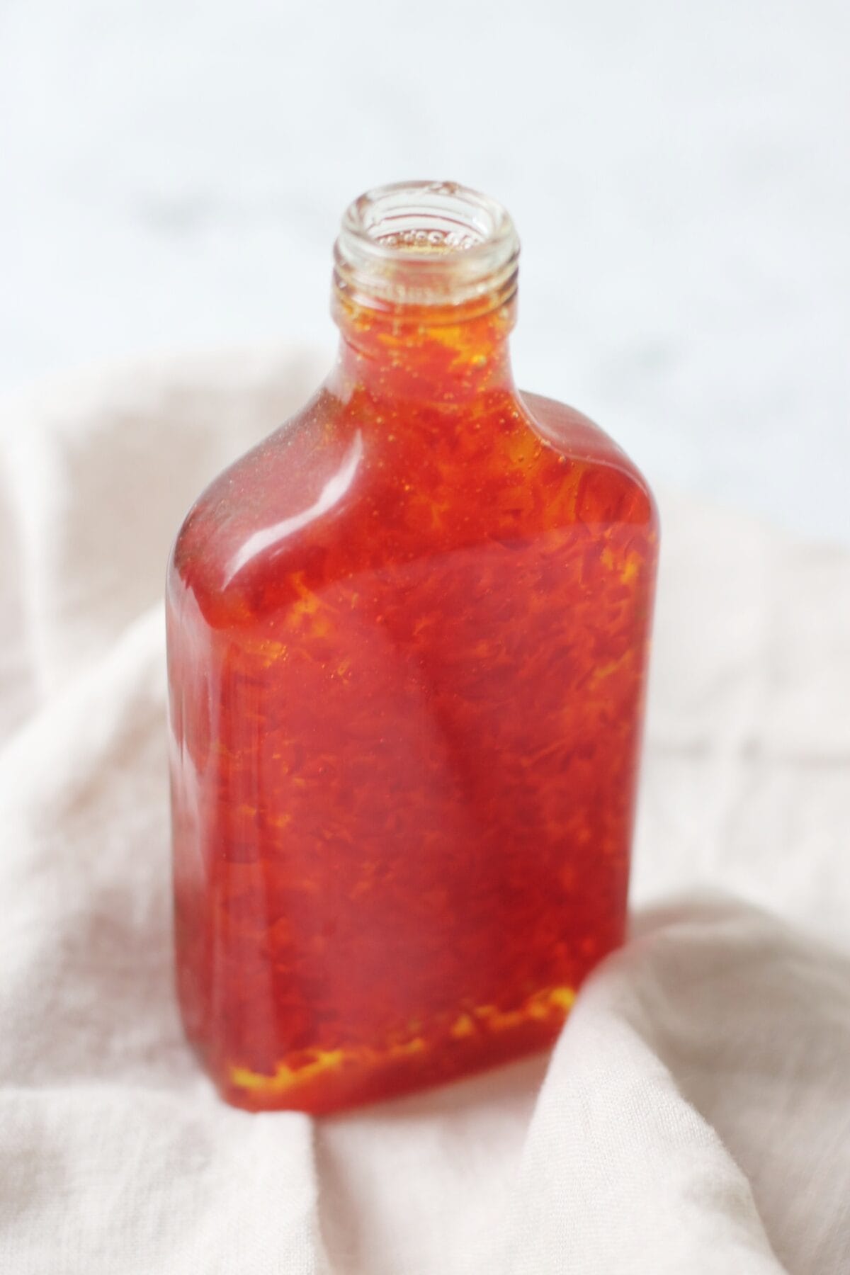 A small bottle of sweet chilli sauce