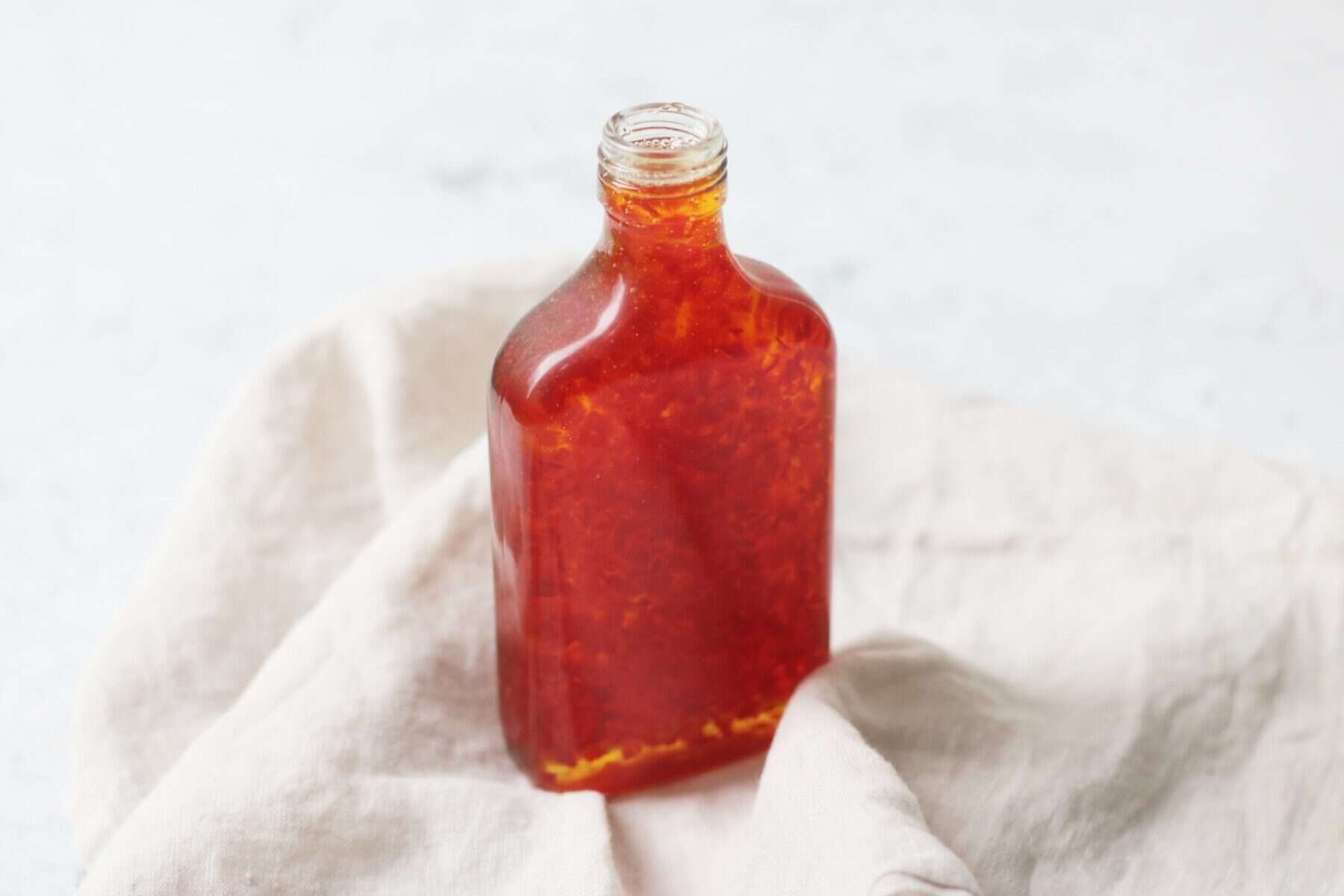 A small bottle of sweet chilli sauce