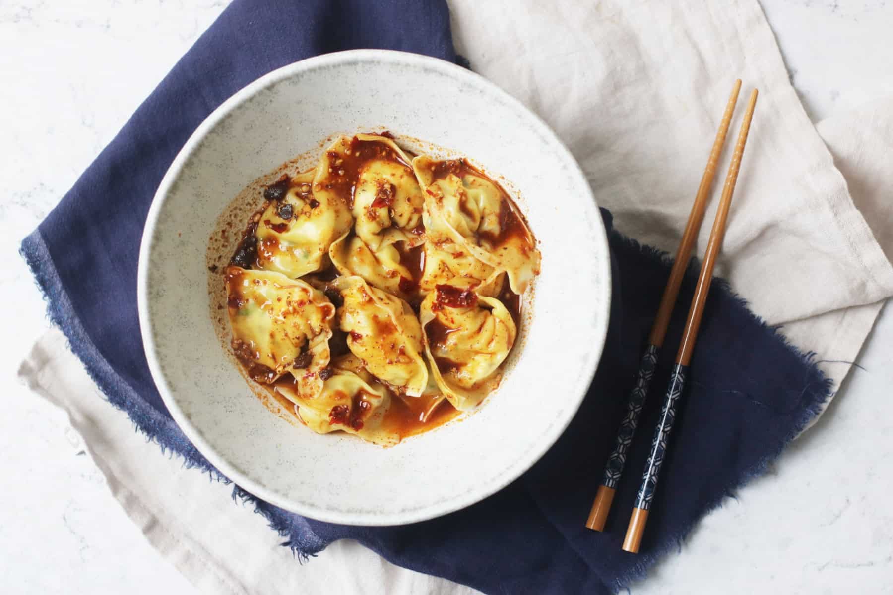 A bowl of Vegan Wontons in Chilli Sauce