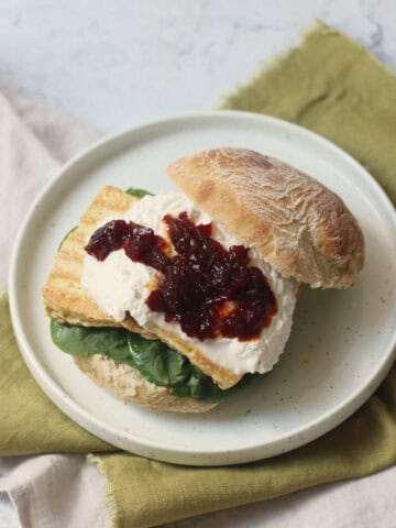 A Vegan Cheese and Chilli Jam Sandwich in a ciabatta roll