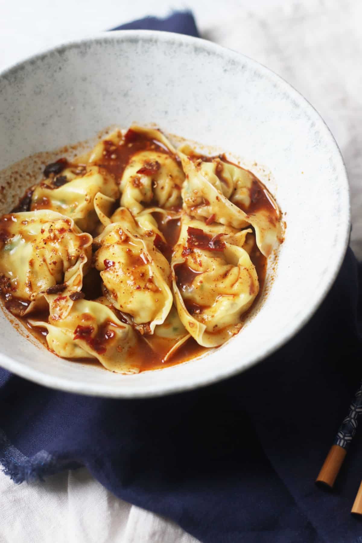 A bowl of Vegan Wontons in Chilli Sauce