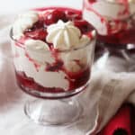 A Plant Based Gooseberry and Strawberry Eton Mess in a glass pudding dish