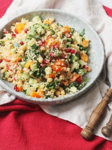 A plate of Herby Couscous Salad with Pomegranate