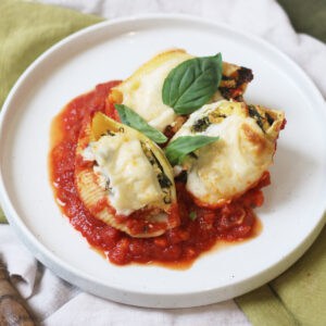 3 Vegan Spinach and Ricotta Stuffed Pasta Shells on a plate