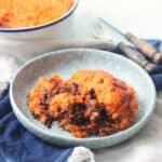 Puy Lentil and Sweet Potato Pie served up on a plate